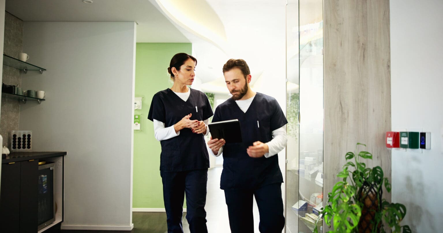 Collaboration, doctors and discussion in clinic, healthcare and advice for research, planning and people